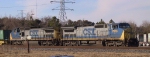 CSX 7876 & 7710 hold down a stack train
